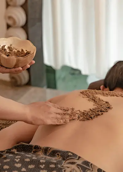 spa treatment with an herbal scrub.