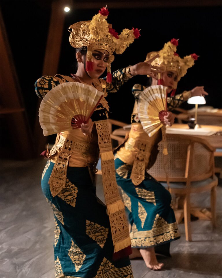 Two girls performing balinese dance