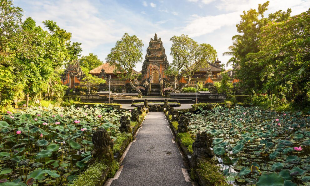 A performance venue with Balinese style surrounded by lotus flowers.