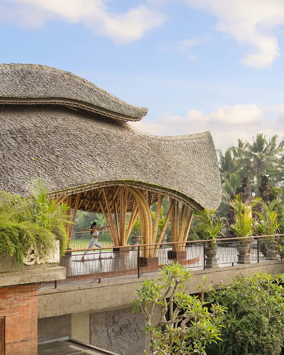 A woman doing yoga in a very comfortable place.